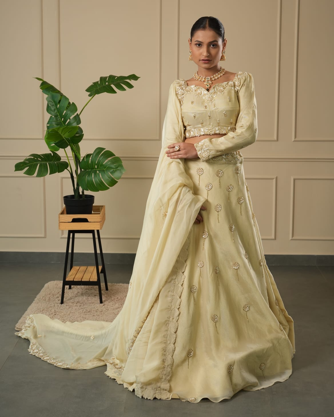CREAM HANGING SELF SEQUEN LEHENGA CHOLI