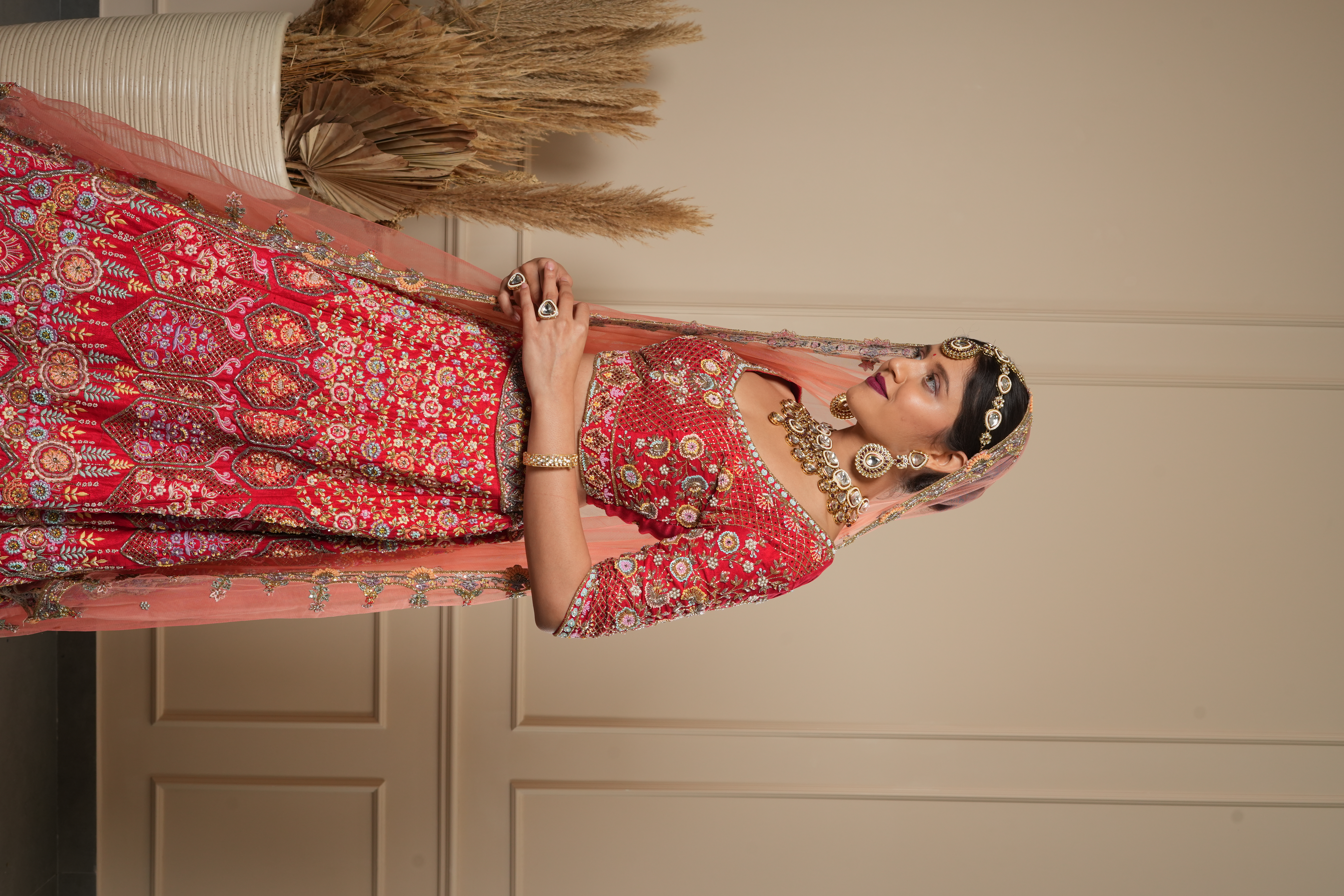 RED BRIDAL WITH MULTY COLOR WORK AND PEACH DUPATTA